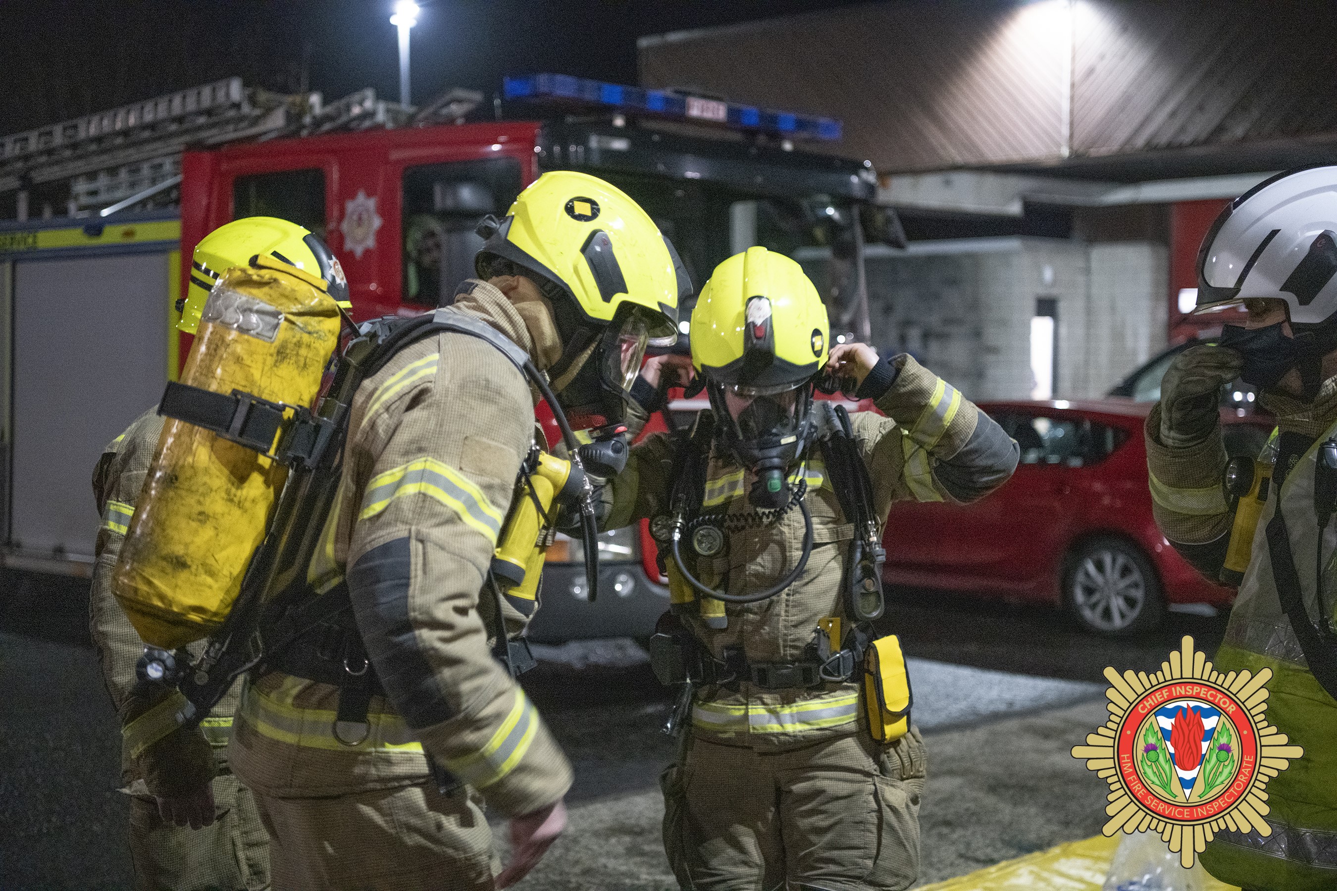 two firefighter's wearing breathing apparatus