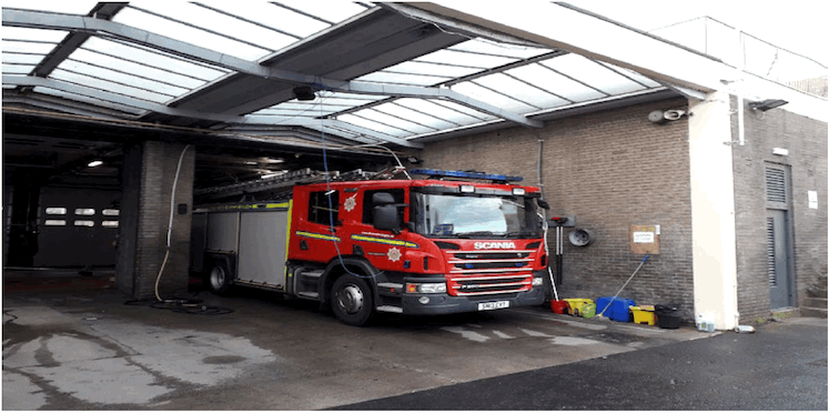 Image 3 Rear wash bay showing appliance in temporary location